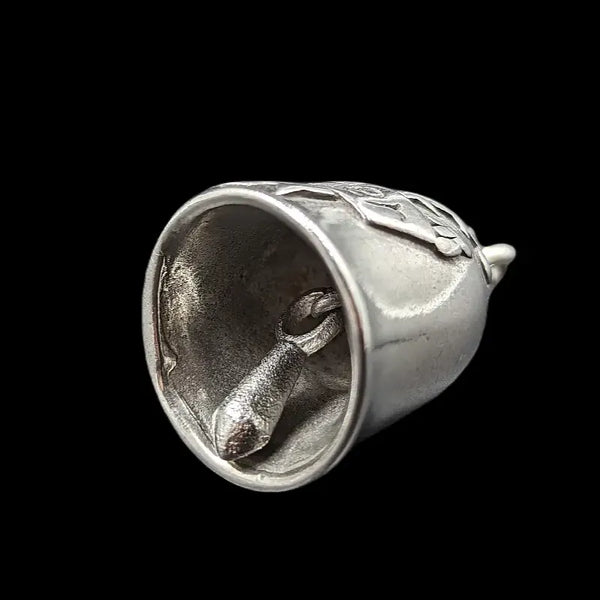 silver motorcycle bell with rose and text of lady rider