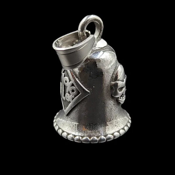 silver motorcycle bell with skull and 1 percenter symbol