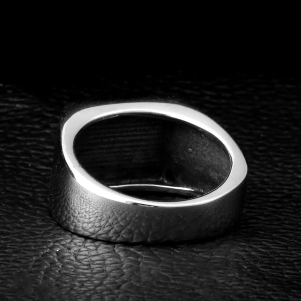 silver ring with ace of spades symbols on front and sides