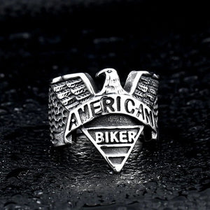 silver biker ring with eagle and text that says american biker