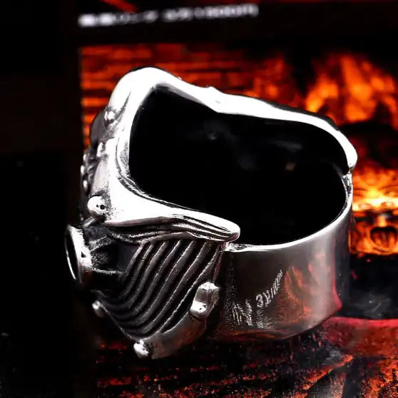 silver ring with lower half of mechanical skull