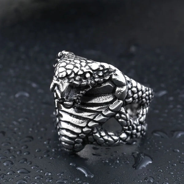 silver ring modeled after a cobra