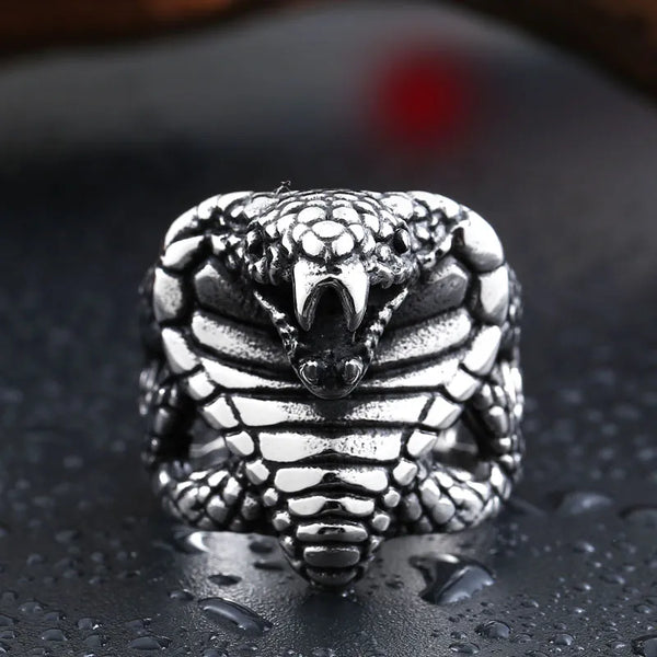 silver ring modeled after a cobra