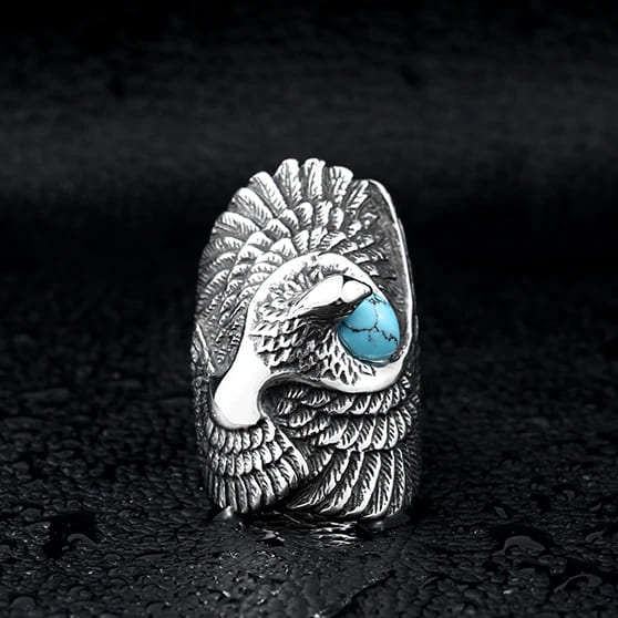 silver ring of an eagle with a turquoise gem