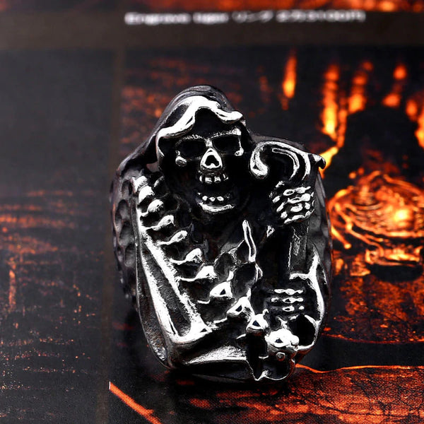 silver ring of the grim reaper holding a scythe