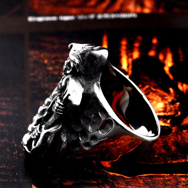 silver ring of the grim reaper holding a scythe