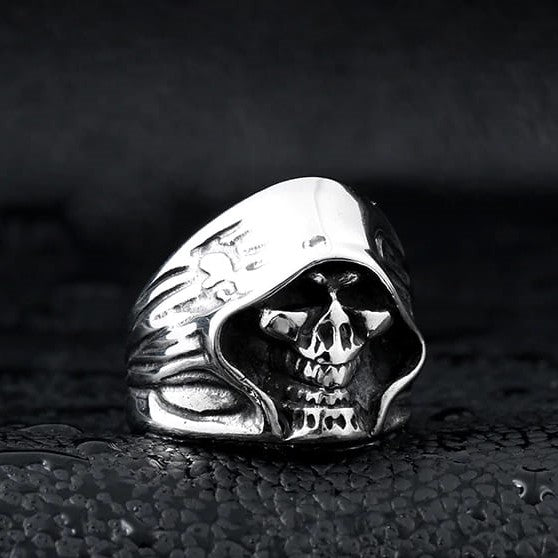 silver skull ring of grim reaper wearing hood