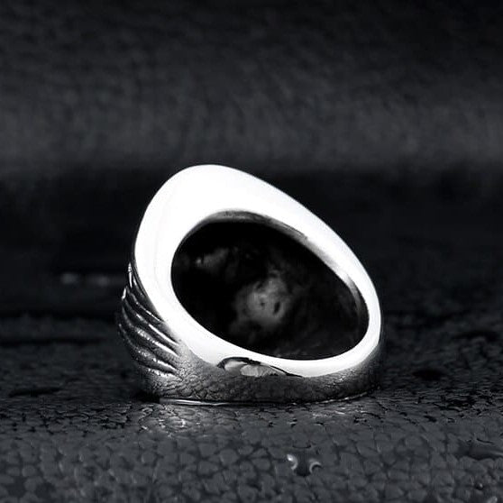 silver skull ring of grim reaper wearing hood