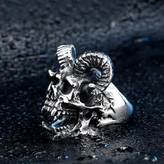 left view of silver stainless steel skull ring with horns
