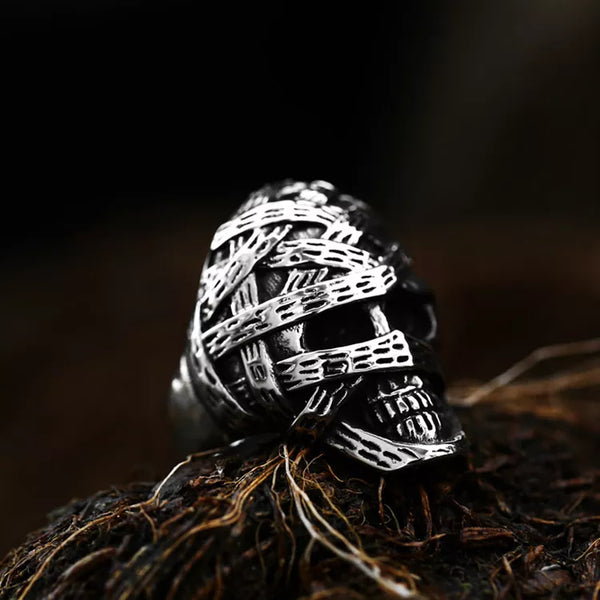 silver skull ring wrapped with mummy bandages