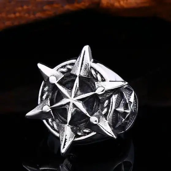 silver pirate ring of nautical compass