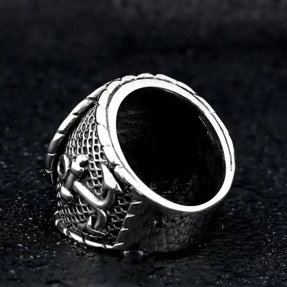 silver ring of pirate's ship wheel and anchor