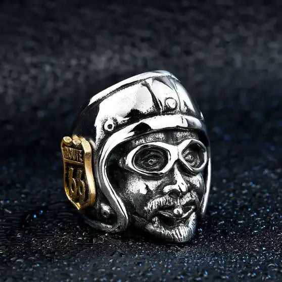silver and gold ring of a biker wearing helmet with route 66 logo