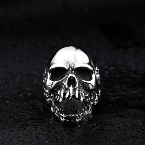 silver ring with screaming skull