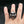 Load image into Gallery viewer, silver ring with screaming skull worn on finger
