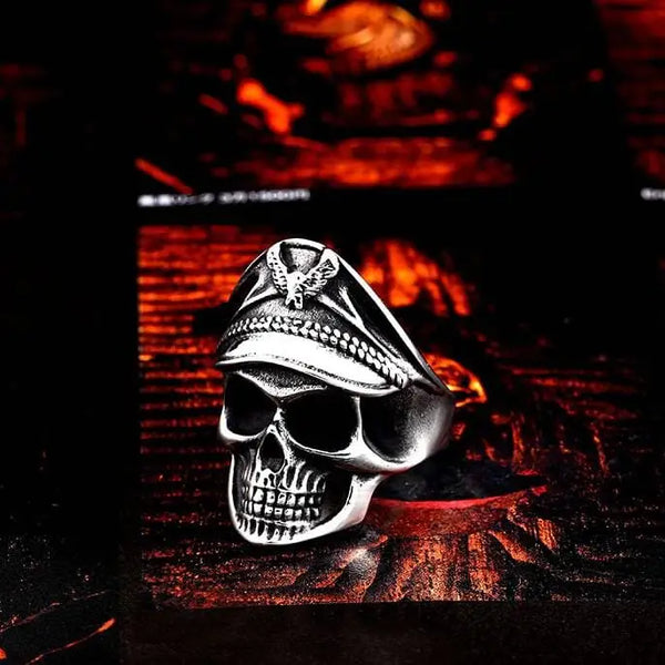 silver skull ring of a pilot wearing a military cover with an eagle