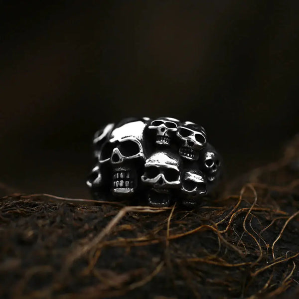silver ring of multiple skulls