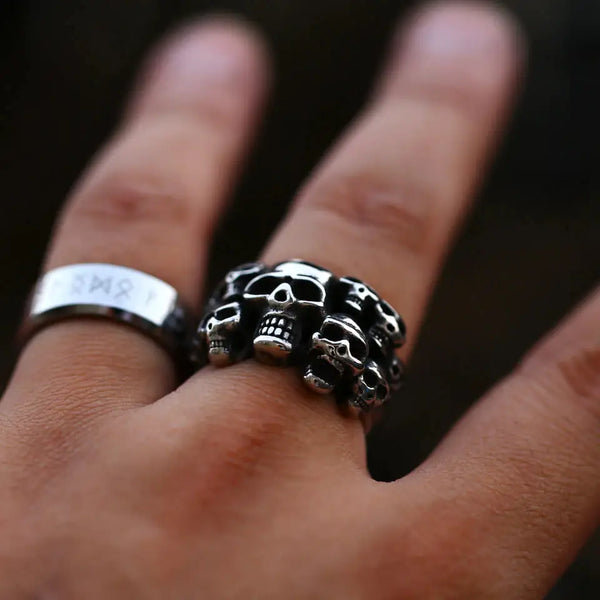 silver ring of multiple skulls