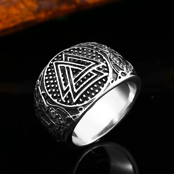 silver ring with valknut symbol