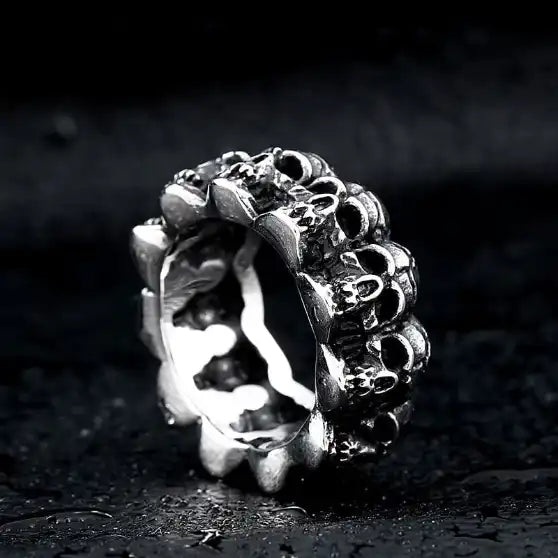silver ring of stacked skulls