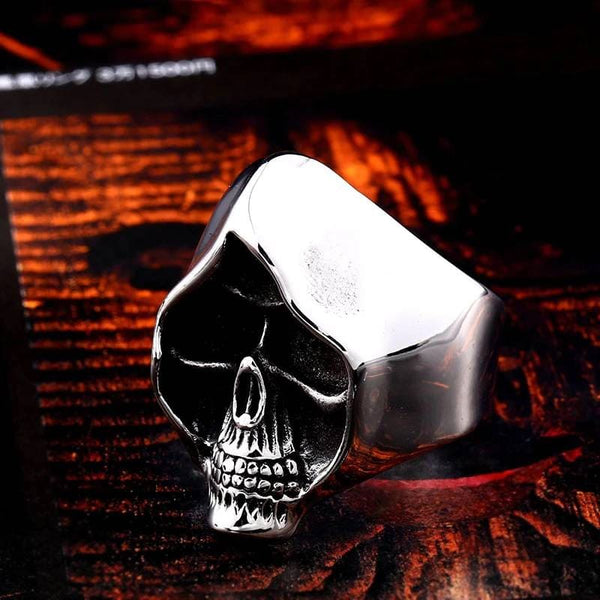 silver skull ring with hood