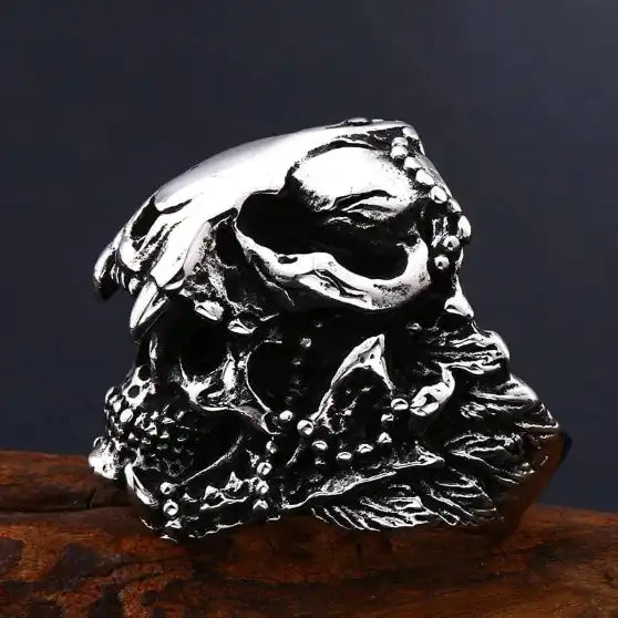silver ring of tribal skull with animal headdress on a branch