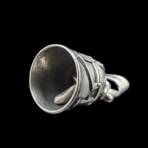silver gremlin bell with viking helmet and horns